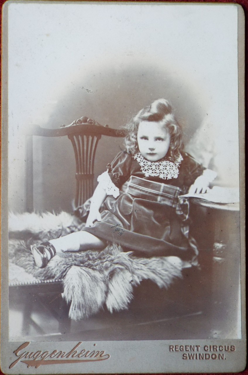 Photograph - Portrait of an infant girl on a chair