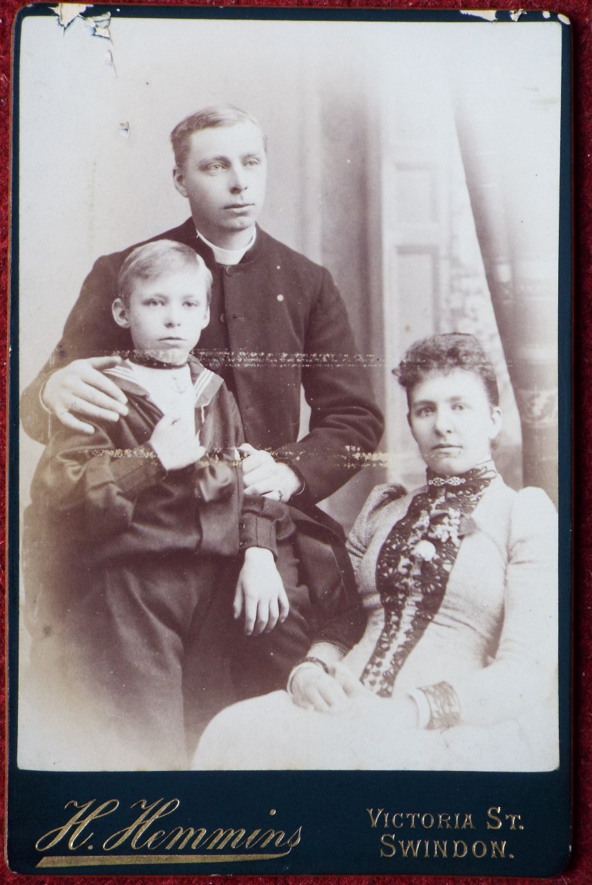 Photograph - Family group - a cleric, his wife and son