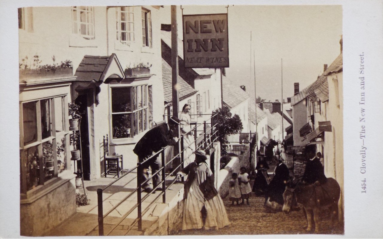 Photograph - Clovelly - The New Inn and street.
