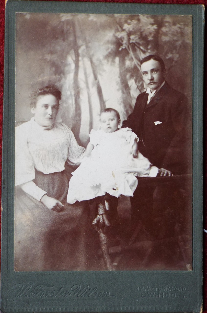 Photograph - Family group of parents and baby